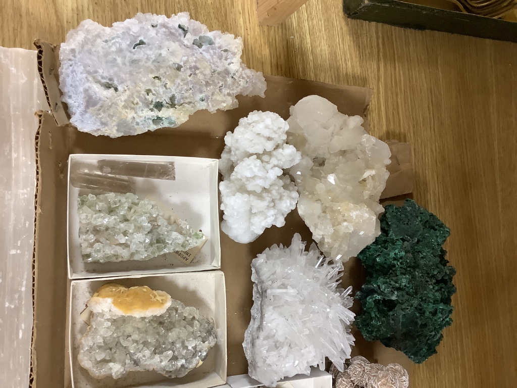 A group of mineral specimens, including two malachite specimens